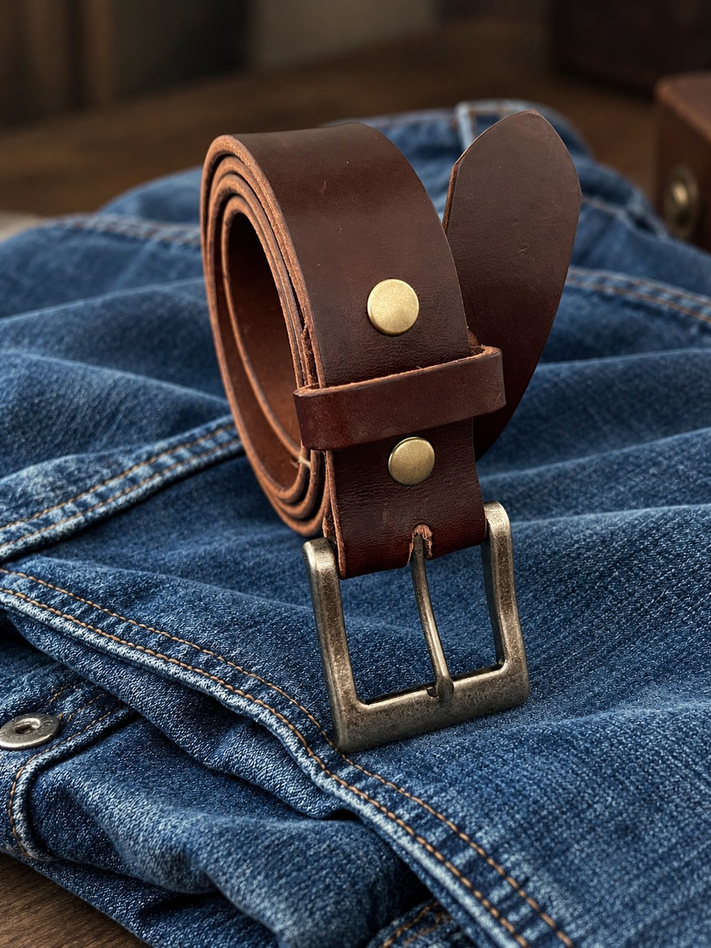Havana Brown English Bridle leather belt with antique nickel buckle on denim