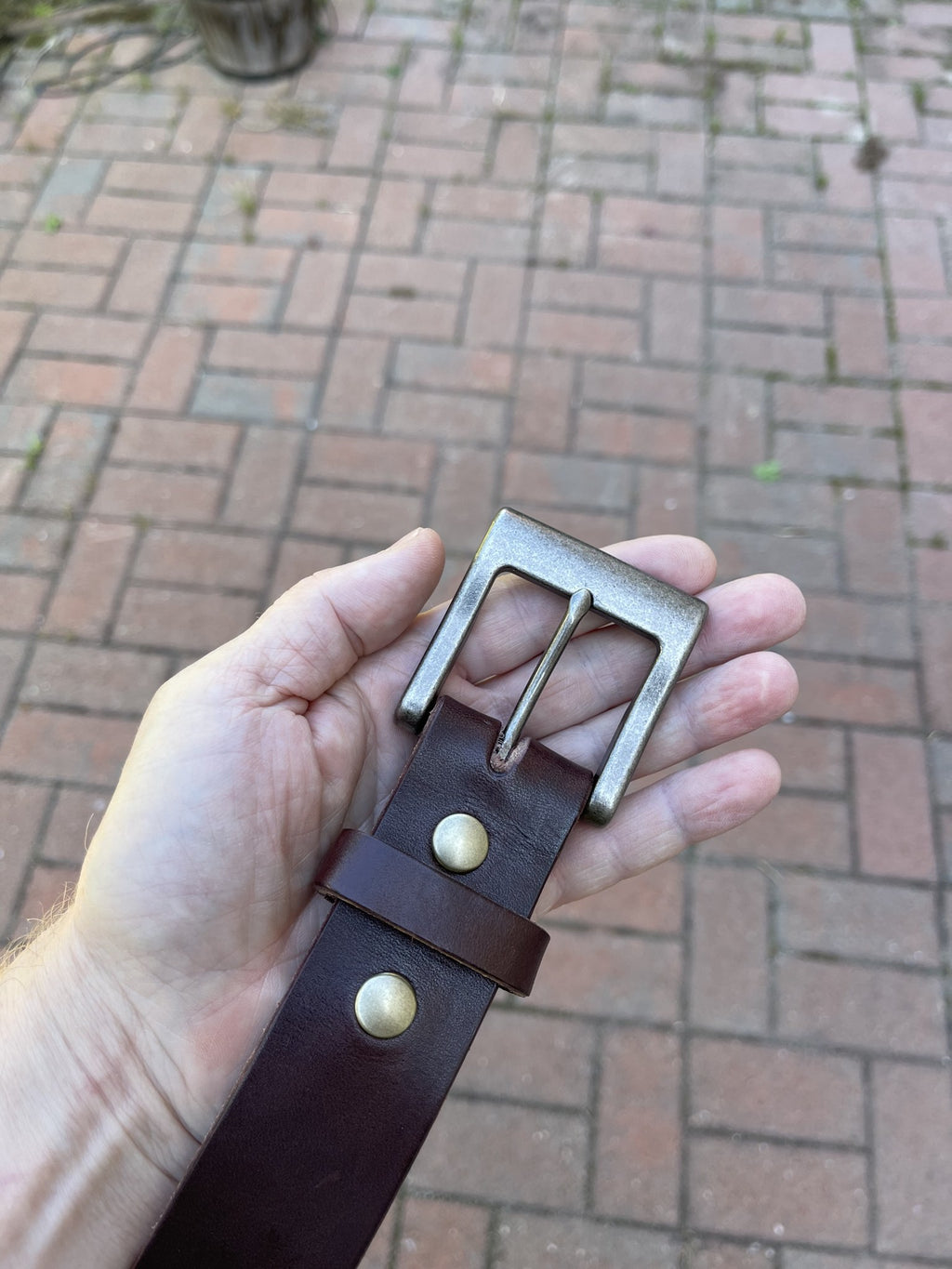 Havana Brown belt buckle and keeper detail
