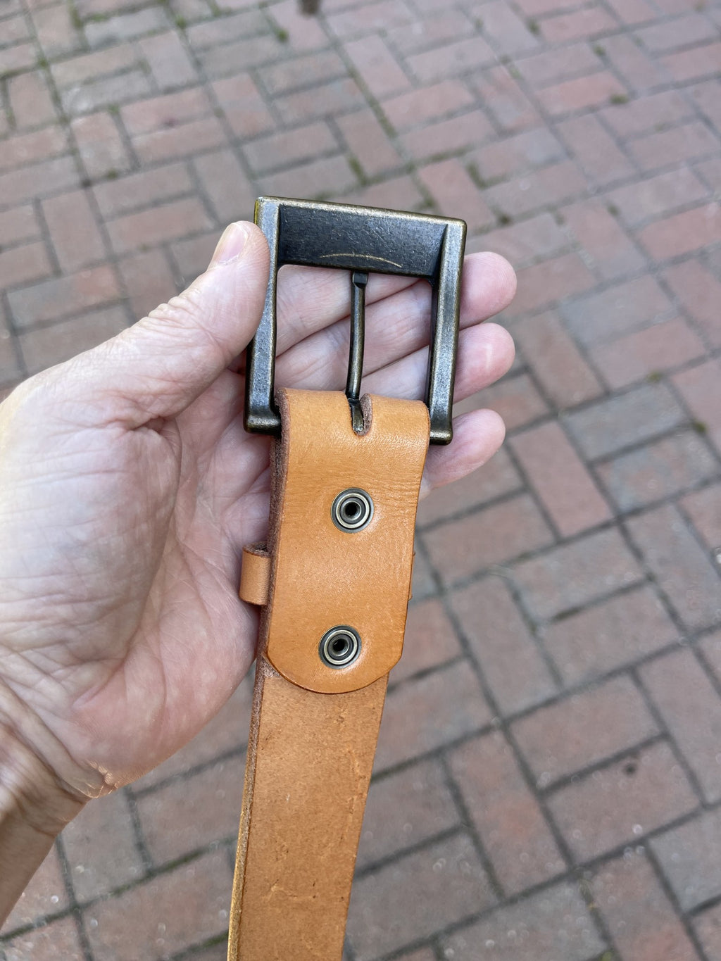 London Tan belt fold and snap detail